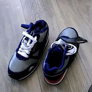 One pair of Reebok sneakers